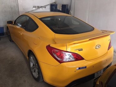 Hyundai Genesis 2012 - Cần bán gấp Hyundai Genesis đời 2012, màu vàng, 470tr