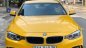 BMW 4 Series 423i 2013 - Cần bán xe BMW 4 Series 423i đời 2013, màu vàng, xe nhập