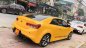 Kia Cerato Koup  2010 - Cần bán gấp Kia Cerato Koup đời 2010, màu vàng, xe nhập